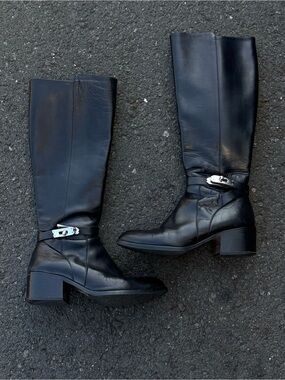 Knee-High Black Leather Riding Boots with Silver Buckle